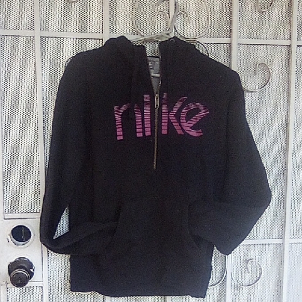 Nike Black Hoodie With 1/2 Zipper And Pouch Pockets.